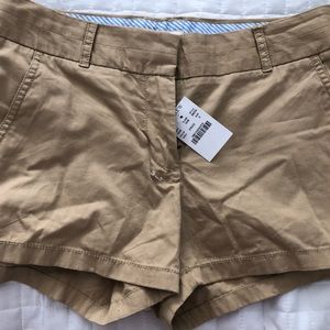Jcrew Khaki 3.5” Chino shorts never worn with tags. Size 0